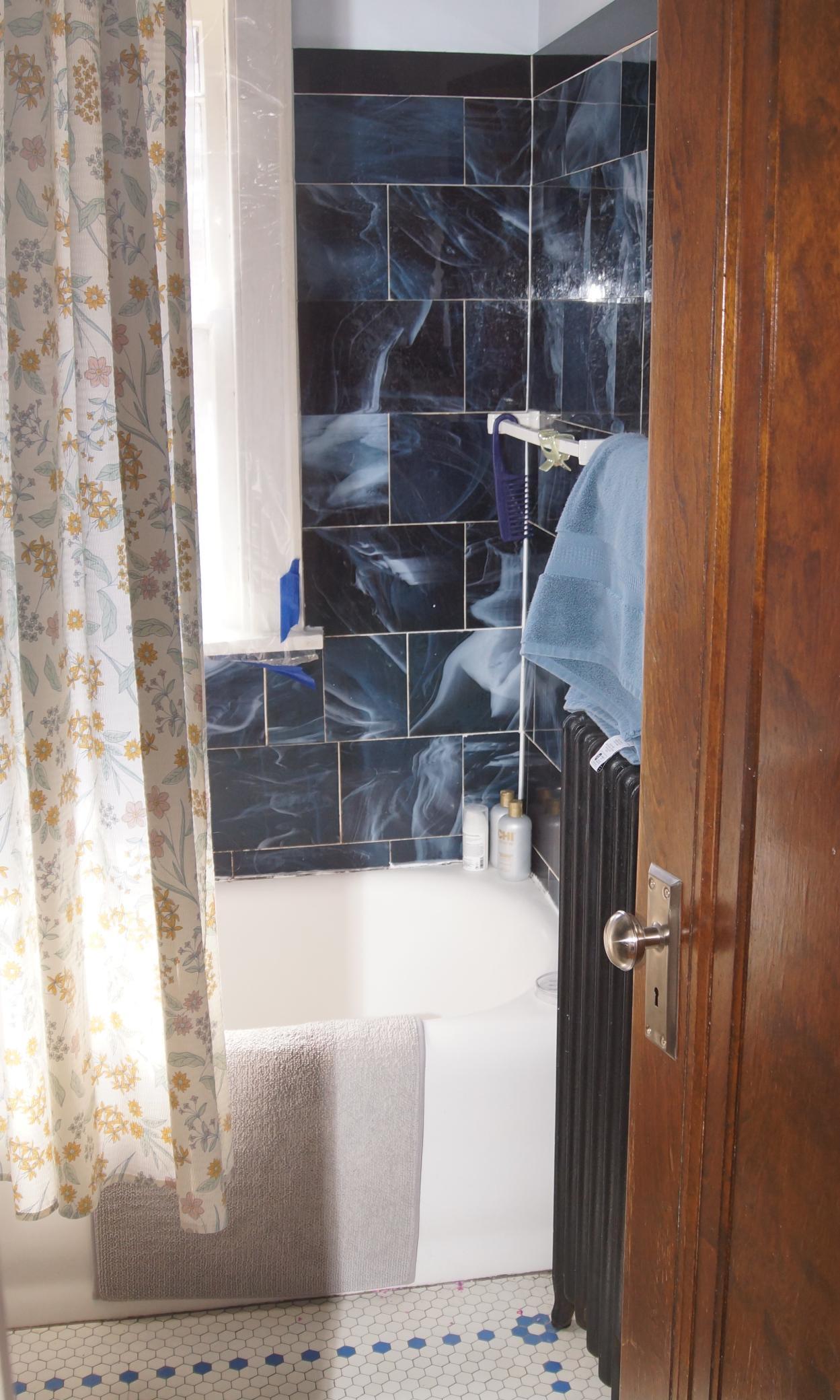 Updated Bath on 2nd Floor finished with tile floors and walls