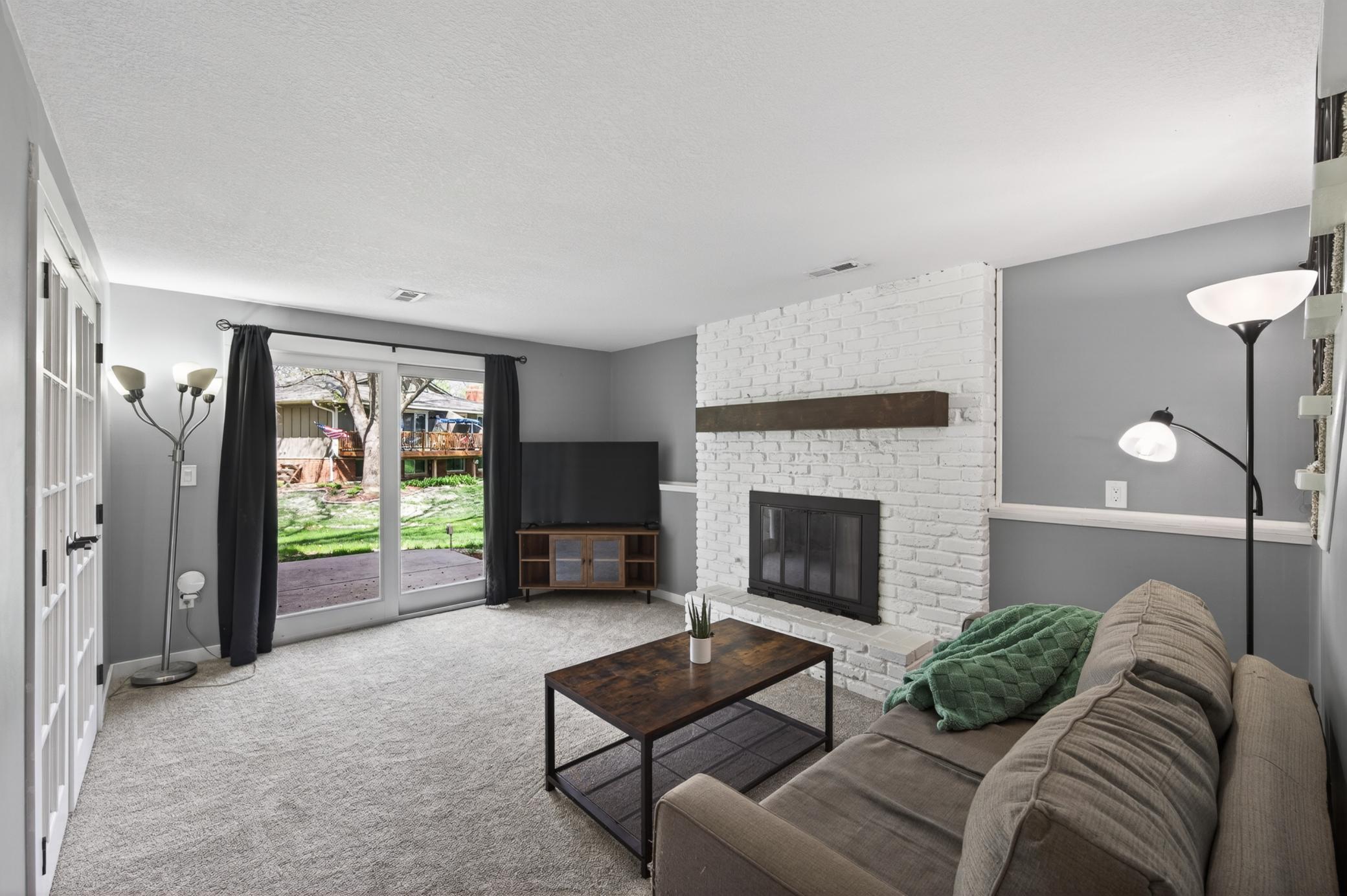 Lower Level with Wood Burning Fireplace