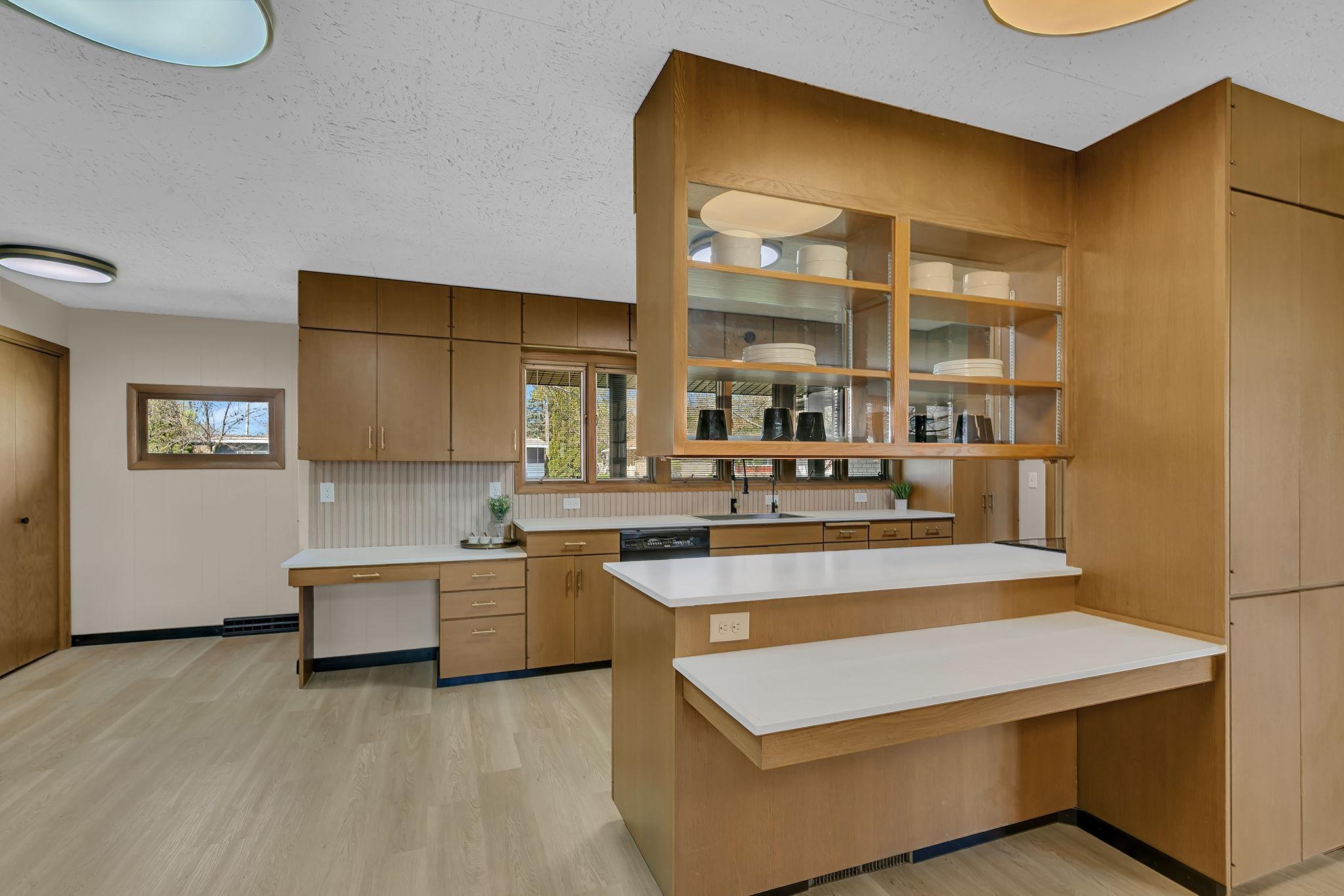 Kitchen combines functionality with mid centry modern appeal.