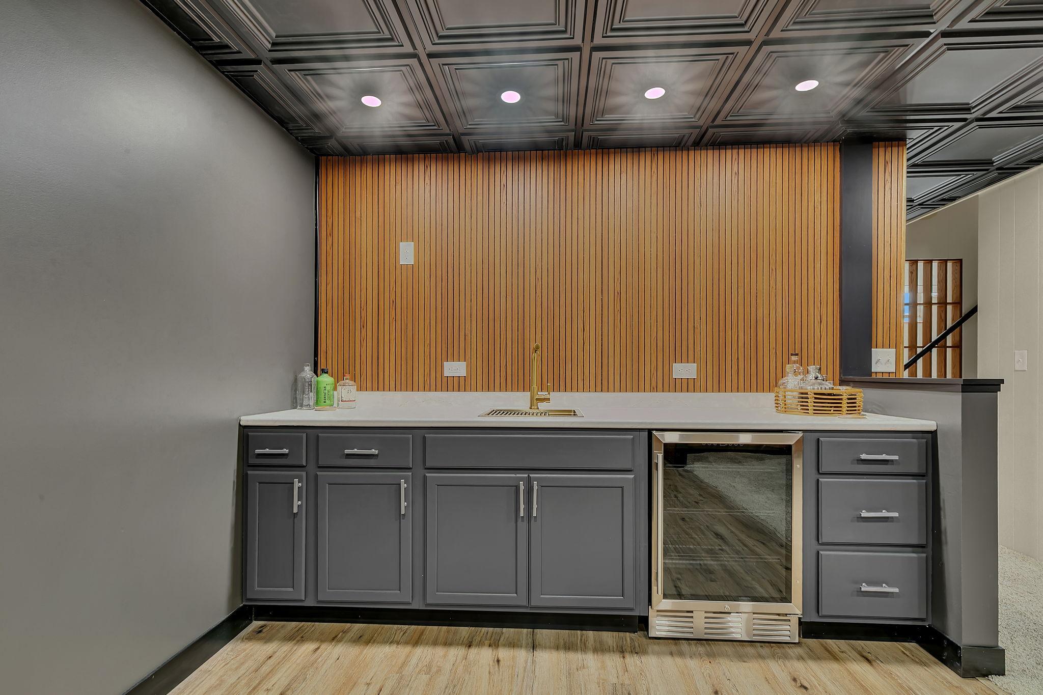 Lower-level bar is perfect for hosting guests, game nights, and social gatherings.