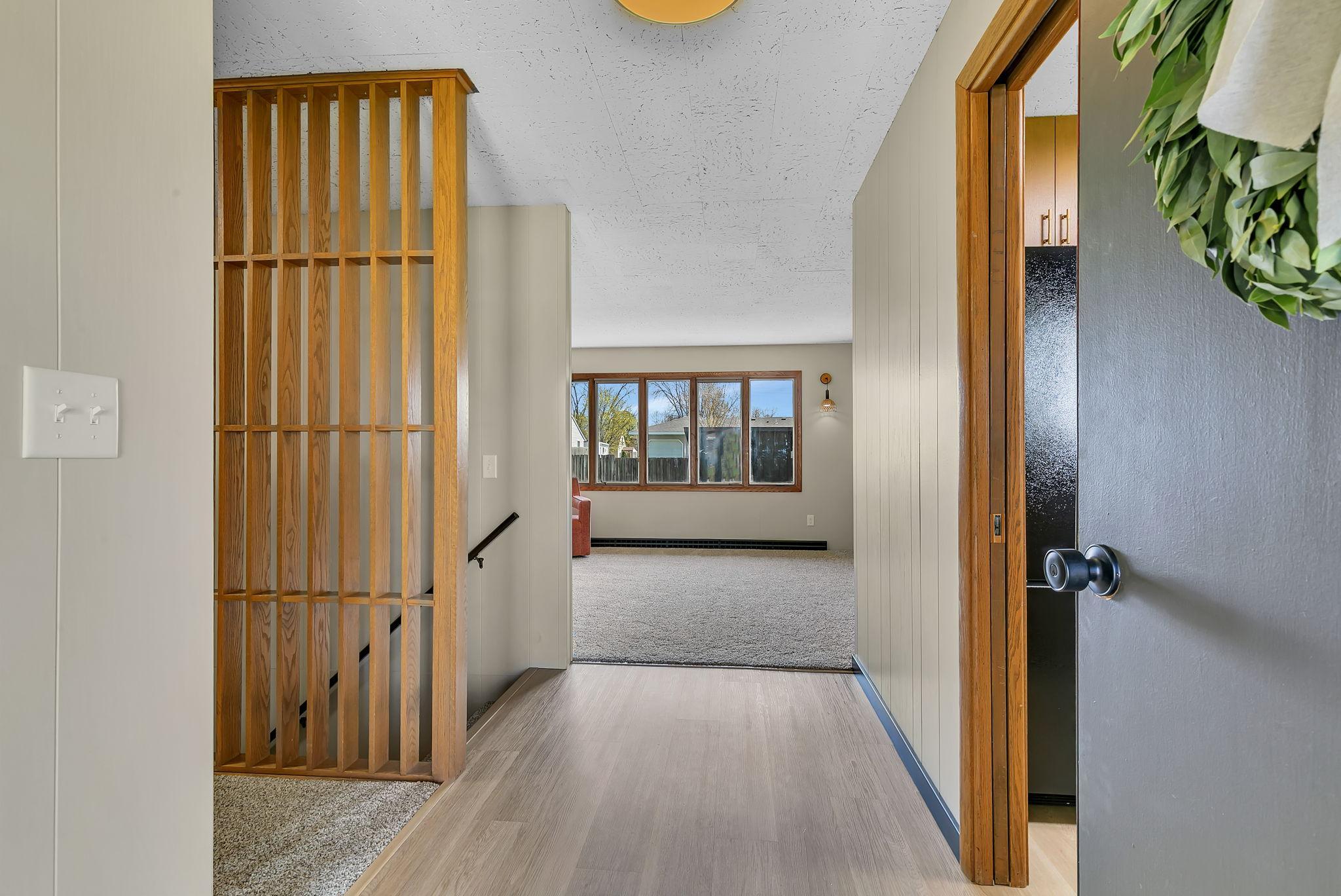 Step into this mid century modern home that has been updated to enhance its original design.