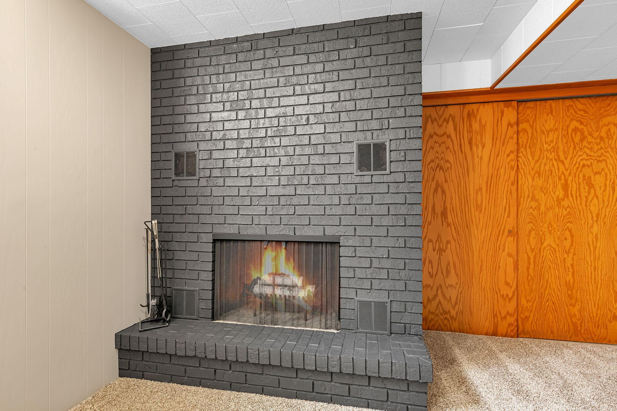 Another bricked in fireplace.