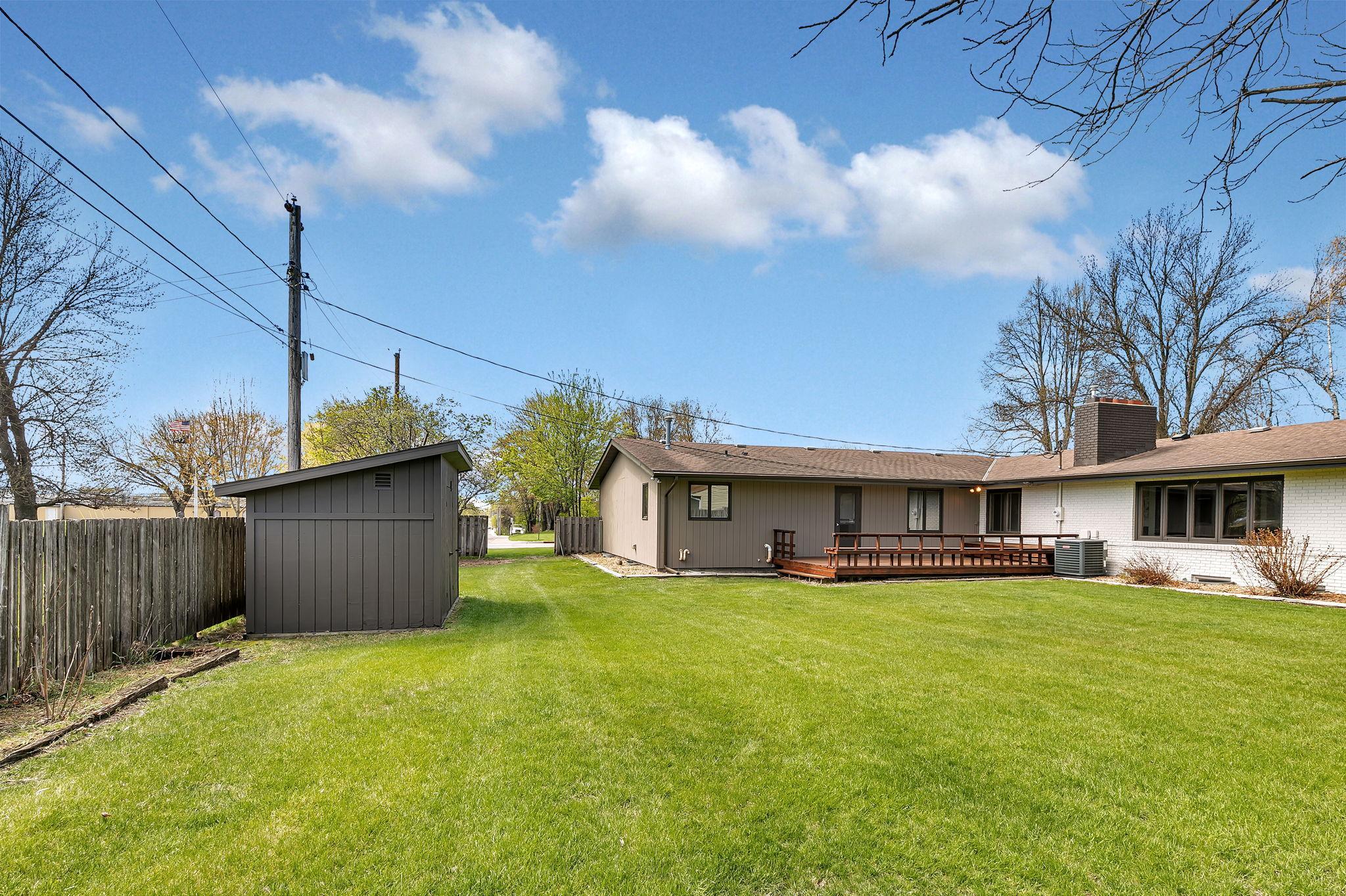 Property features a utility shed.