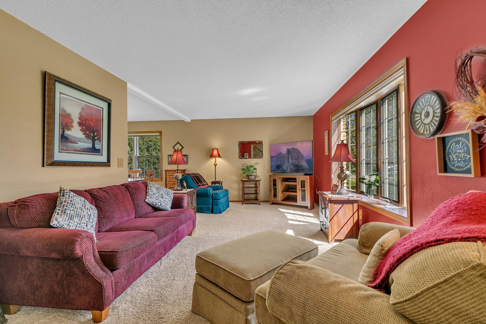 Comfort abound in the family room overlooking the front yard.
