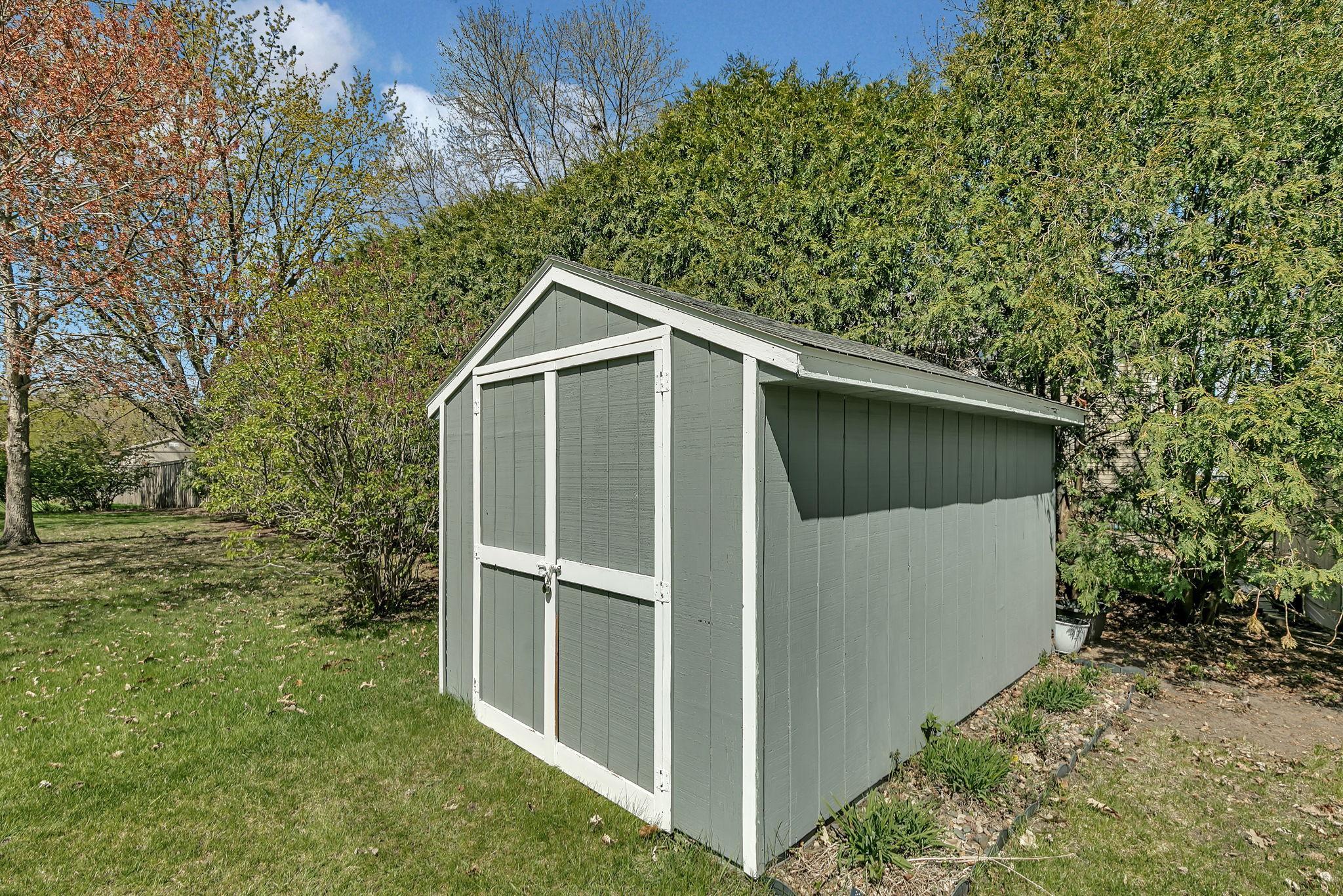 Convenient storage shed.