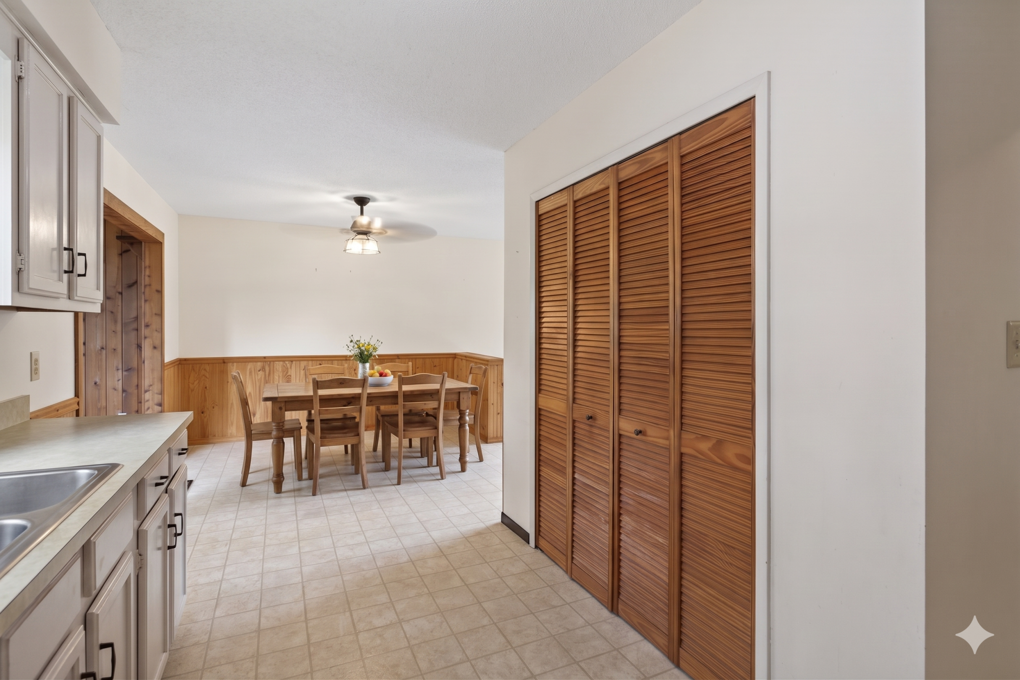 Main level: dining room (virtually staged)