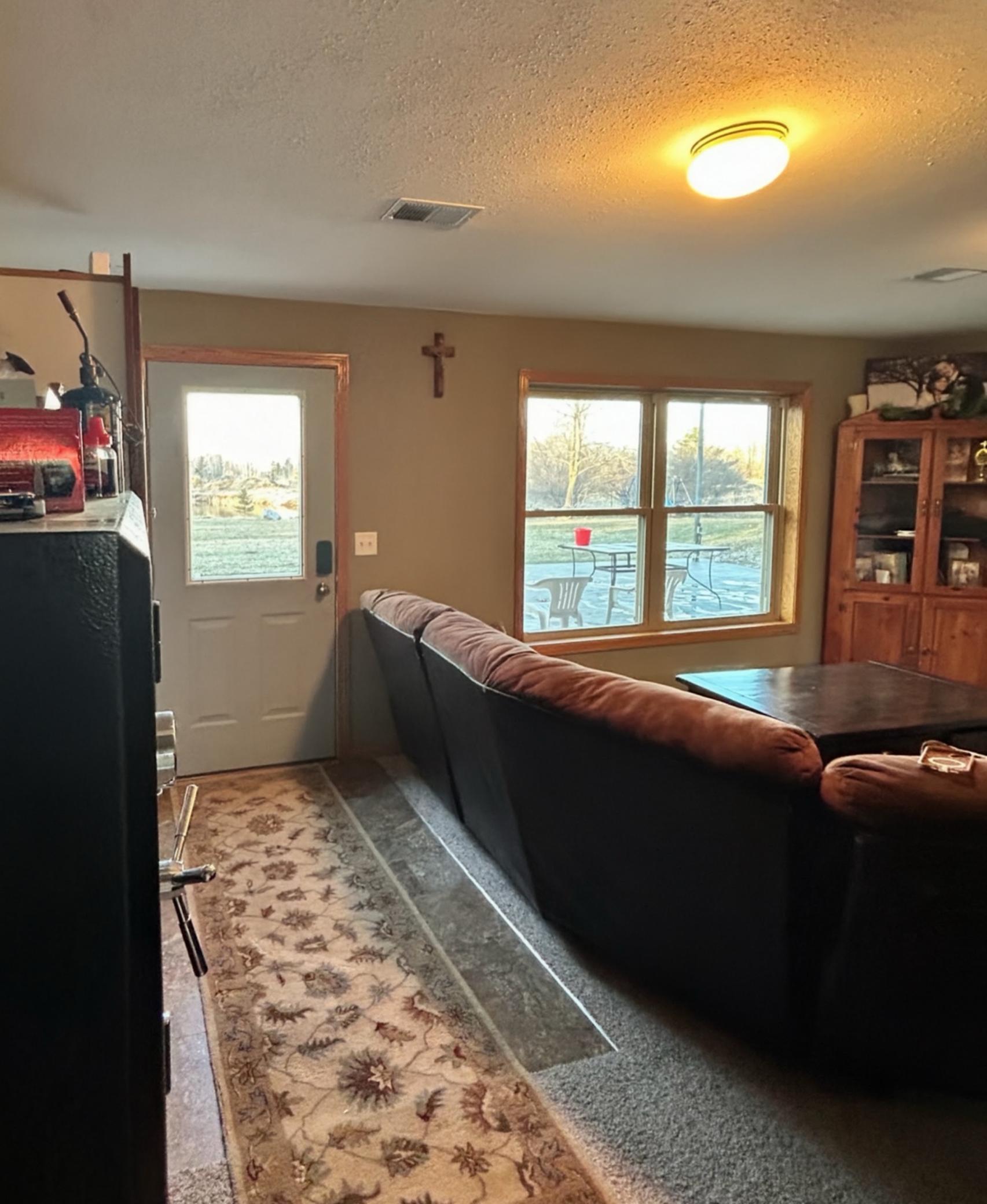 Lower level has 2 family rooms, with a walkout door to a large concrete patio for entertaining and hanging out