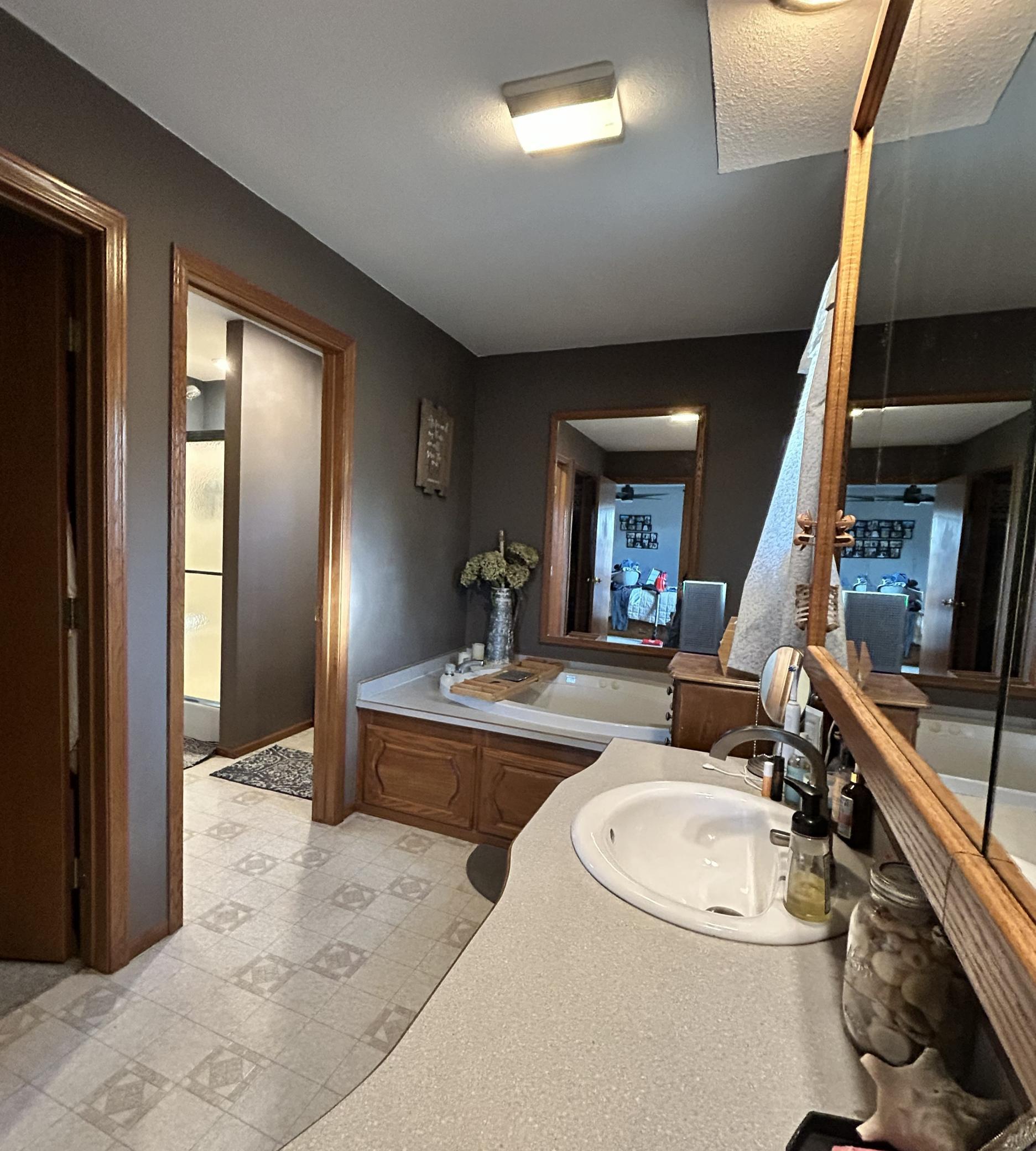 Primary bedroom suite, with walk in closet, jetted tub, separate shower, great views, lots of space