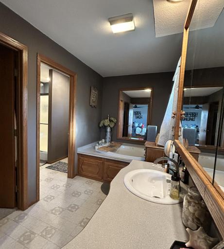 Primary bedroom suite, with walk in closet, jetted tub, separate shower, great views, lots of space