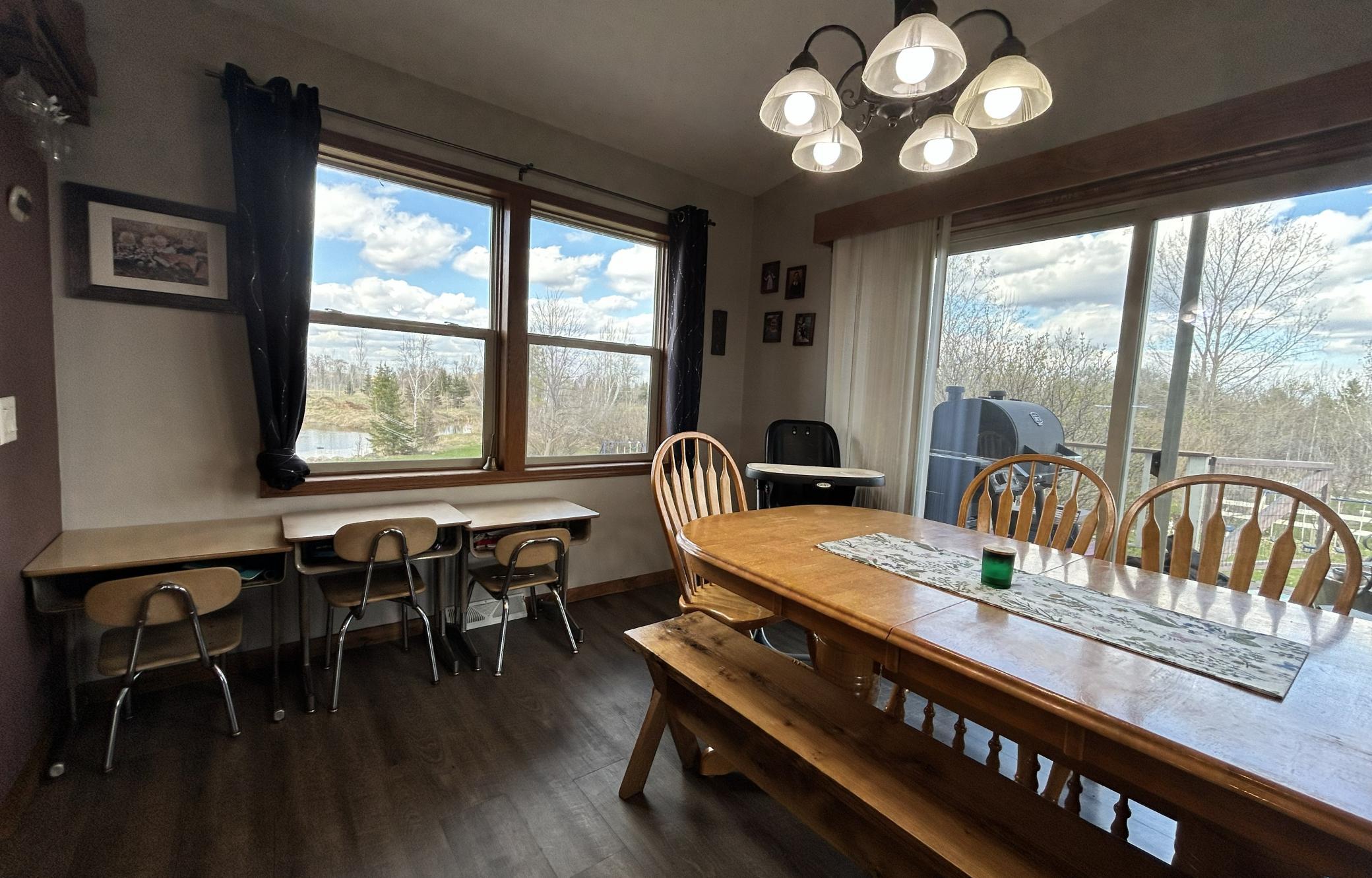Breakfast bar at the counter, natural woodwork, lots of windows and light, and the views are great!