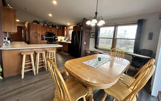 Great size dining room, breakfast bar at the counter, and patio doors to the deck!