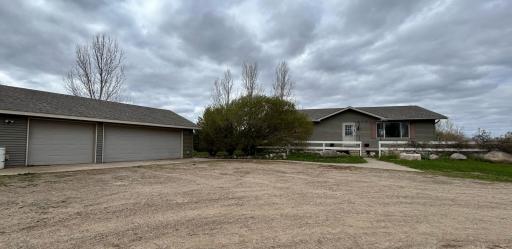 Three stall garage, lots of room for storage and projects.