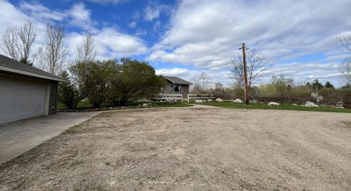 No shortage of parking space with the ample driveway and big ring road