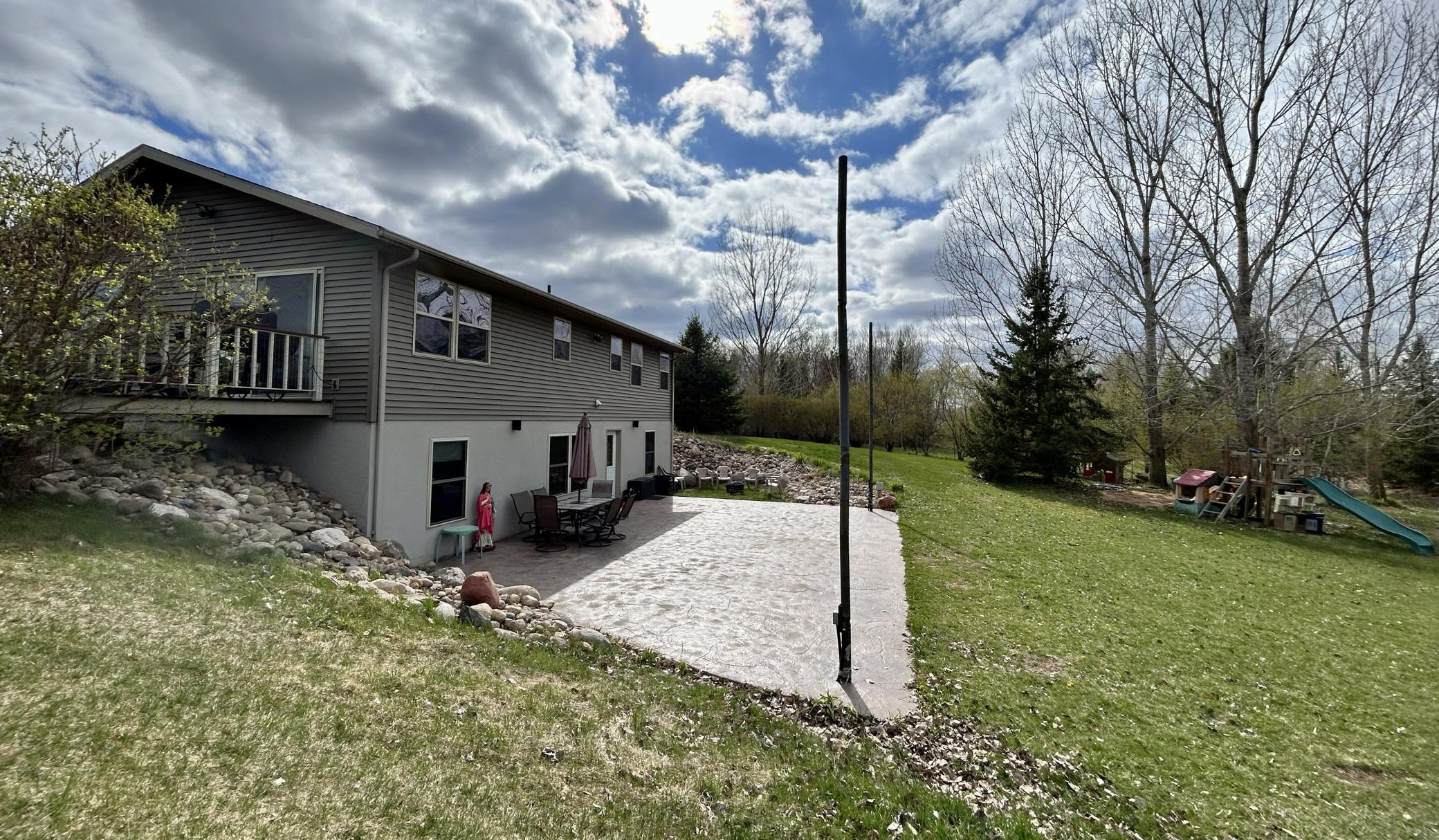 Stamped concrete patio in the back, you can entertain and make great memories out here!