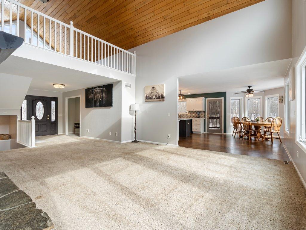 Stunning Vaulted Tongue and Groove Ceilings Making This Space Feel Grand.jpg