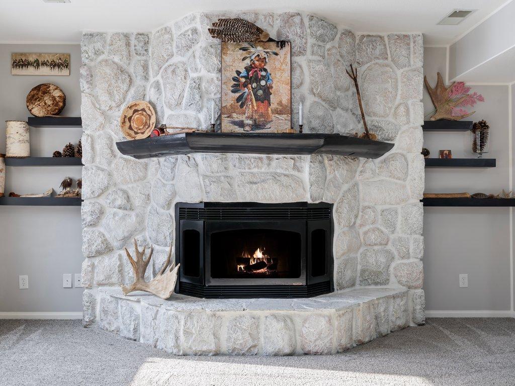 Lower Level Stone Fireplace.jpg