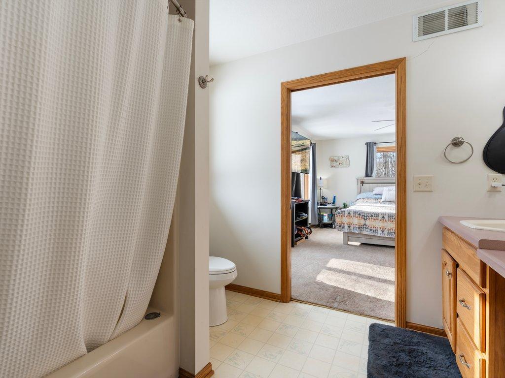 Primary Suite Bathroom with Double Vanity.jpg