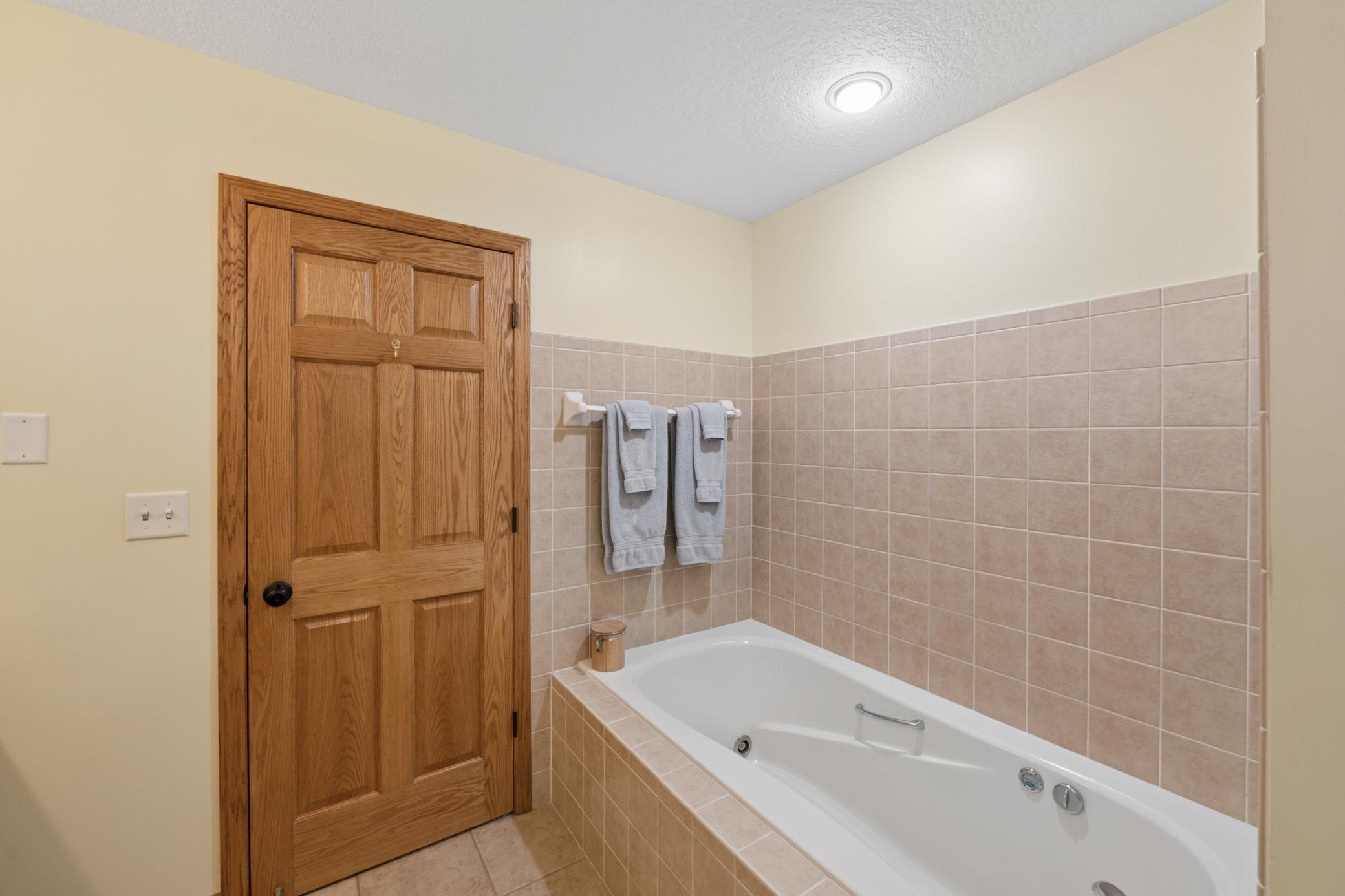 Soaking tub in the primary bath.