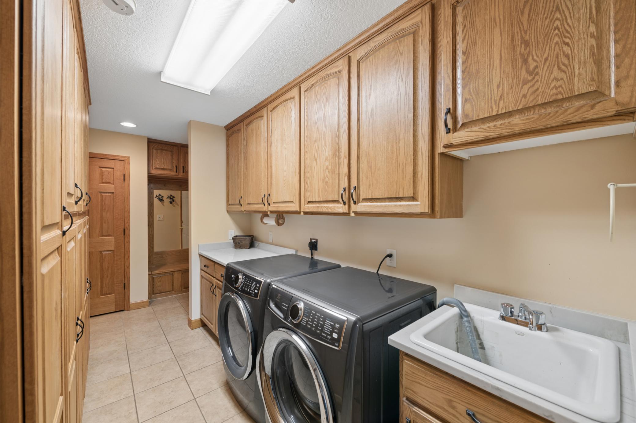 Huge laundry area...main floor - easy access and lots of cupboard space!