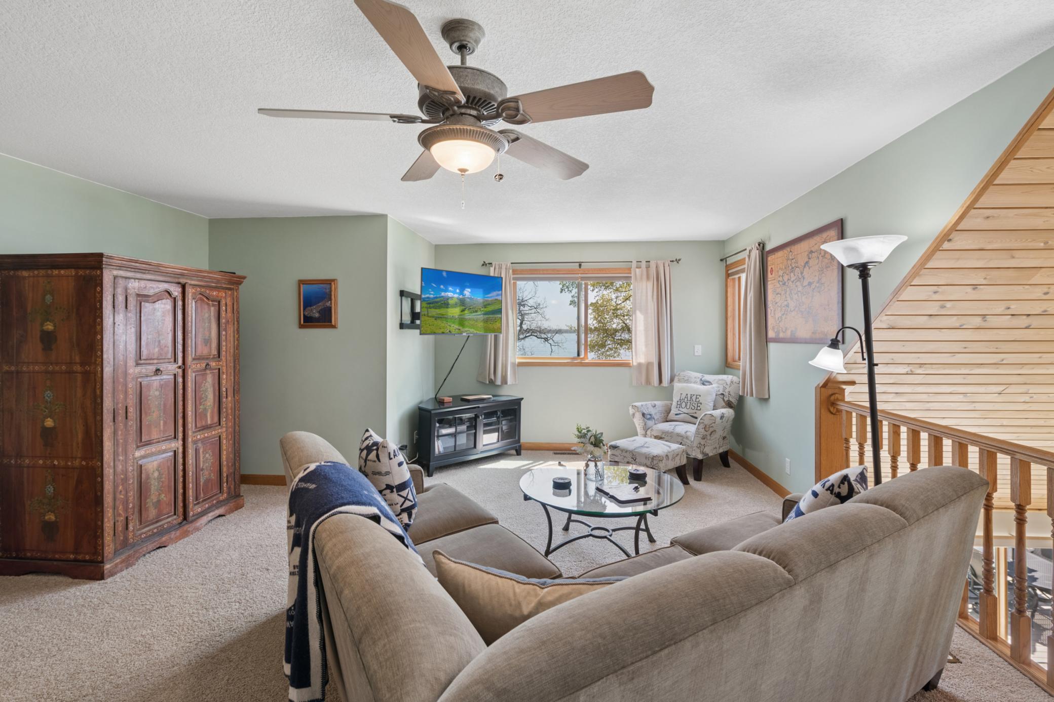 Second level family room area - over looks the lake too. This space can be super multi-funcational.