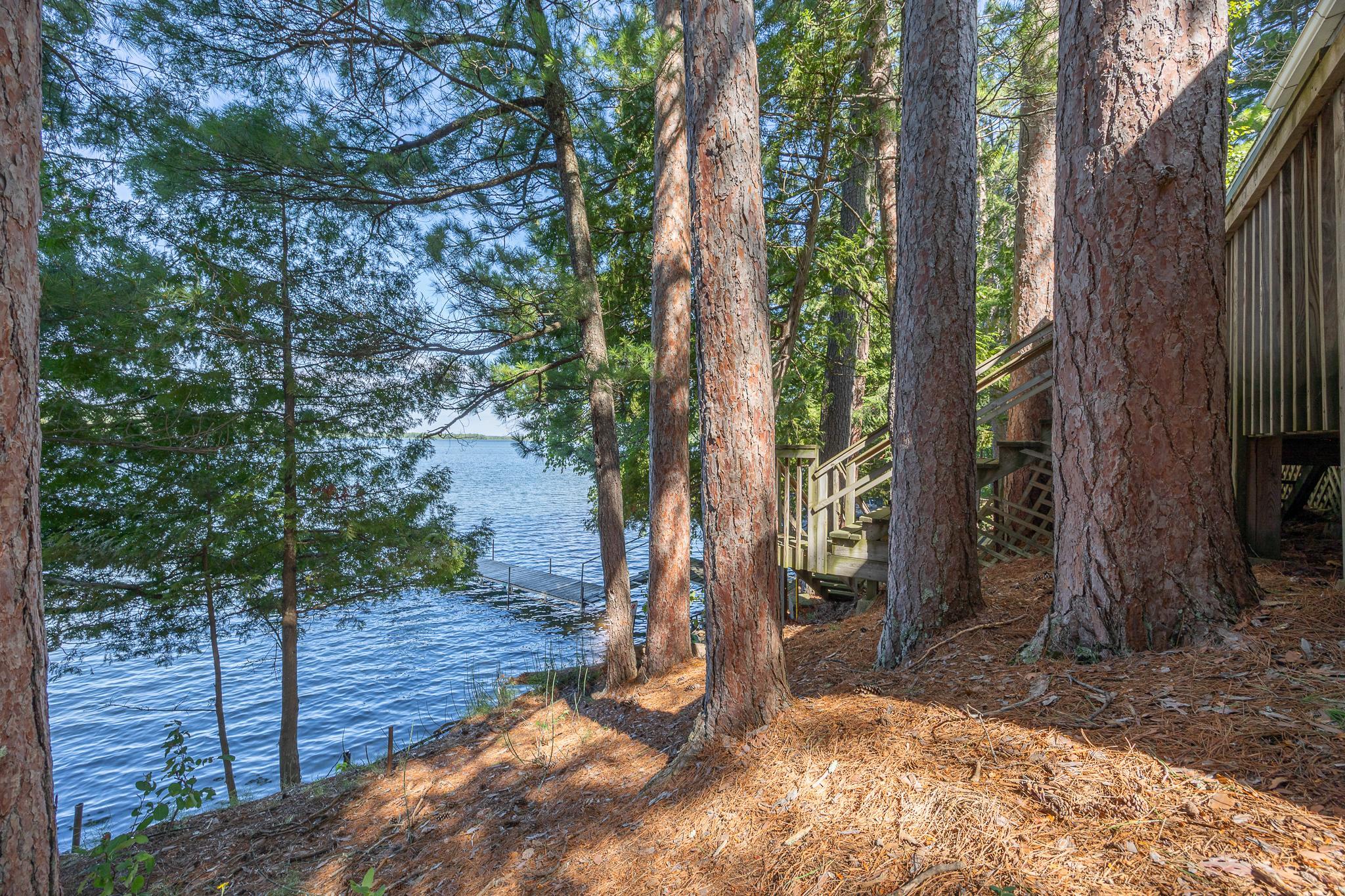 This quaint cabin sits near the waters edge