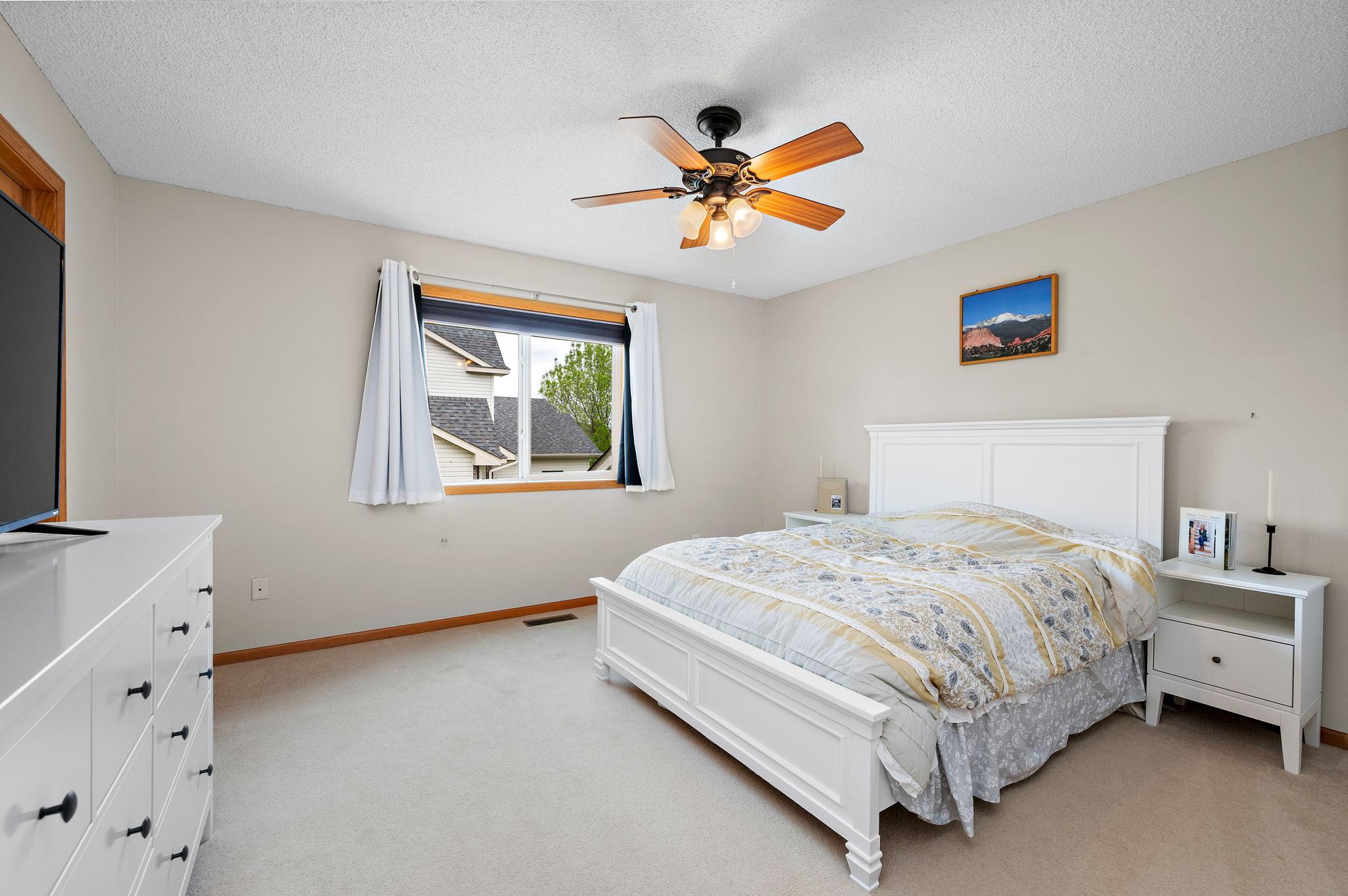 Main floor Primary Bedroom with walk-in closet