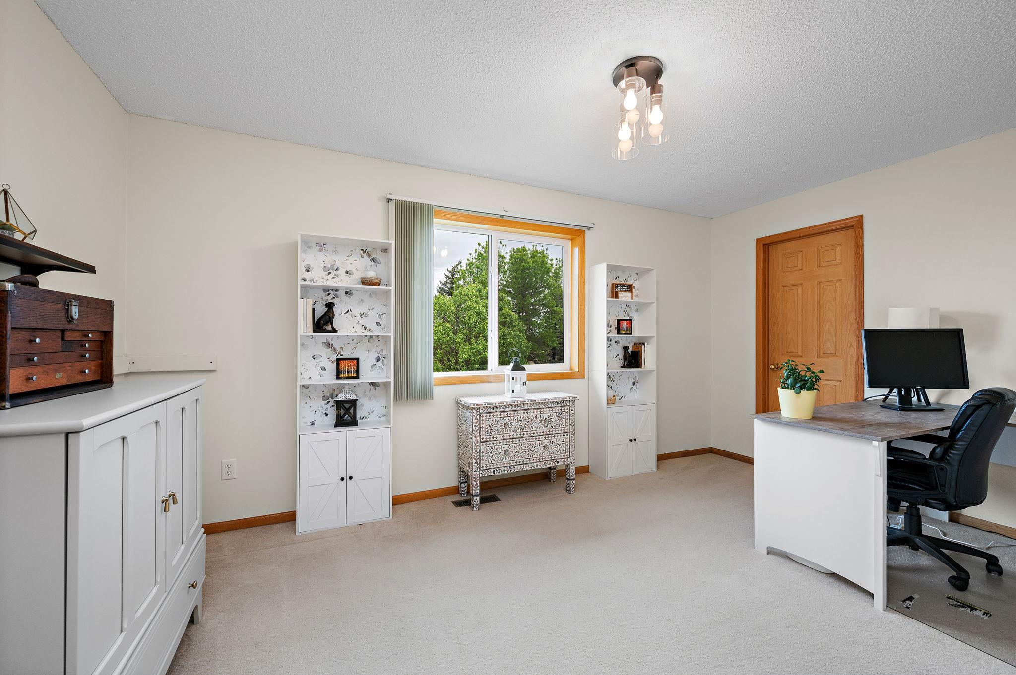 2nd main floor bedroom with walk-in closet