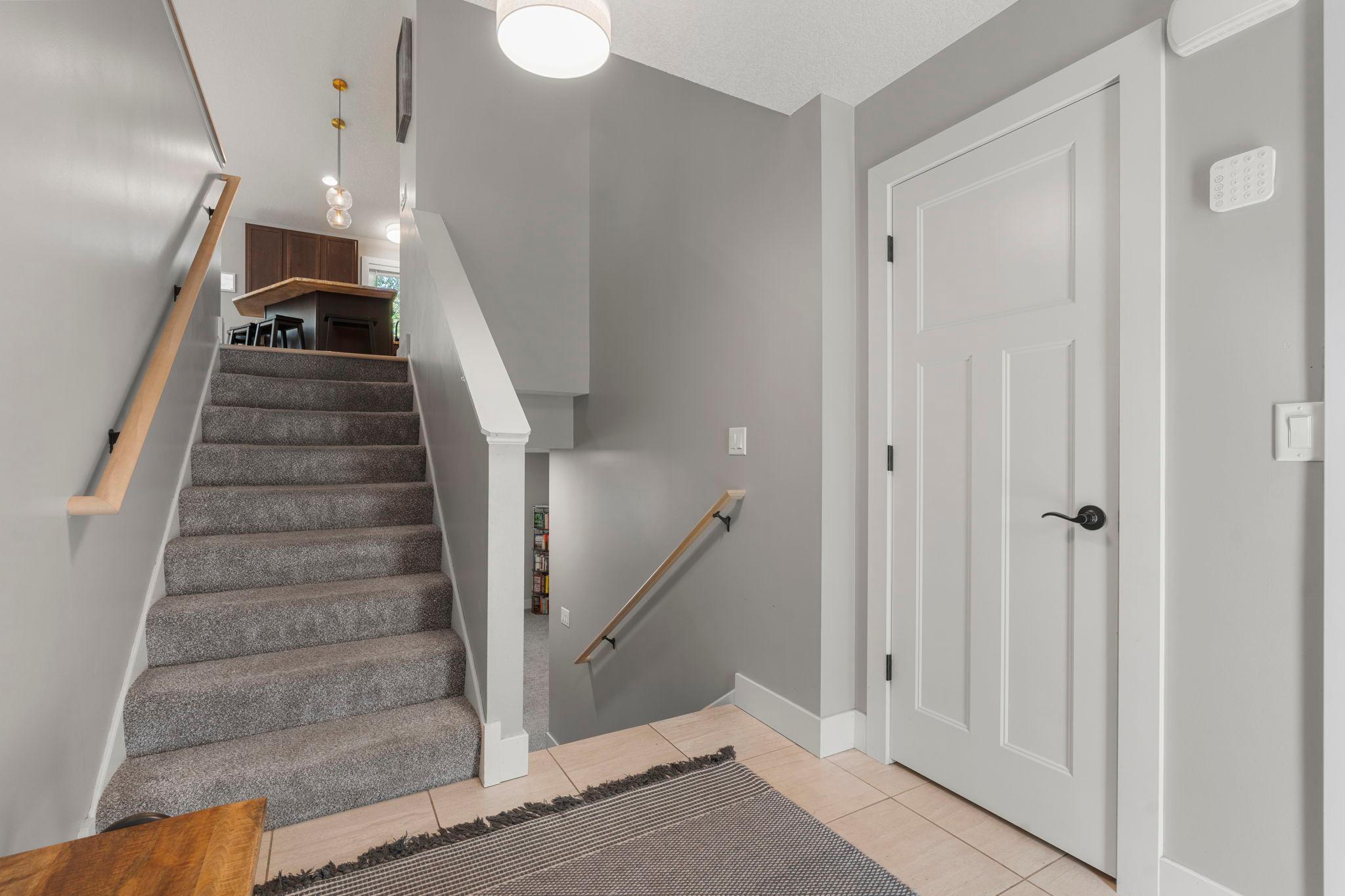 Large foyer with tiled floors