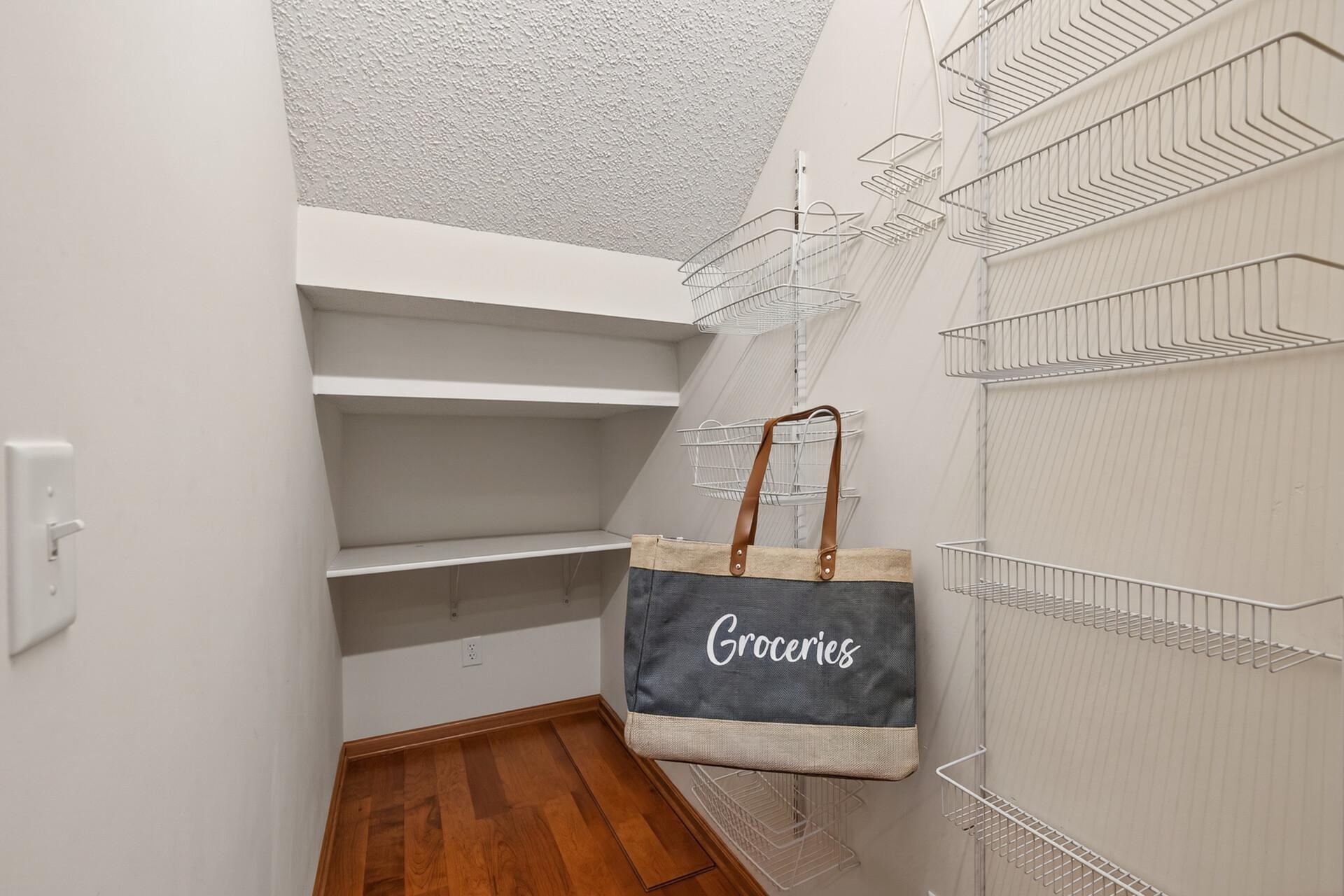 Storage space in kitchen area with shelving all set to go!