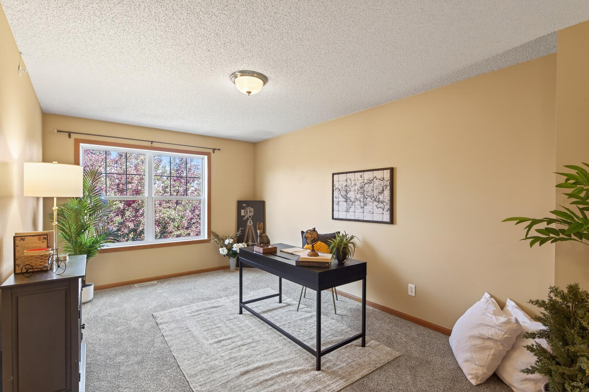 Large loft area for a home office, workout space, additional living room, or convert to a bedroom!