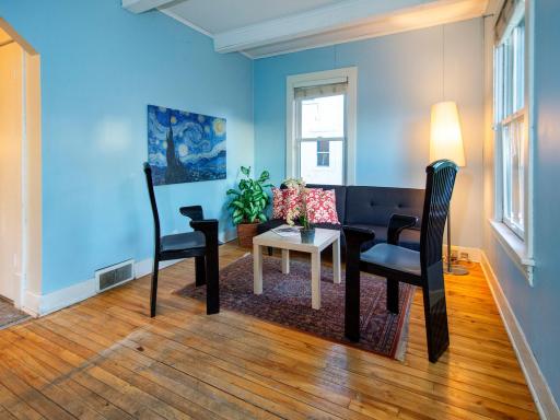 The spacious front area consist of the living room on one end.