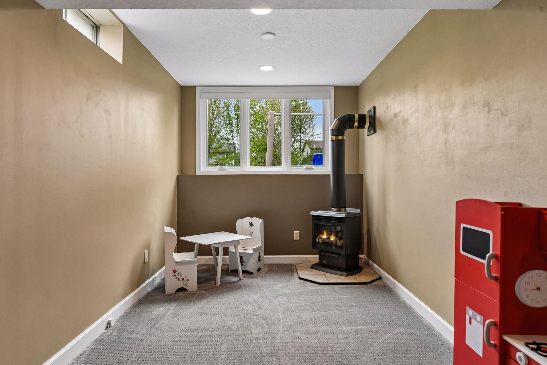 Flex space with a cozy gas stove.