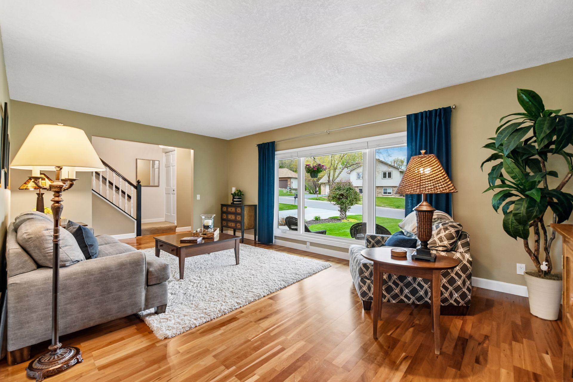 Rich cherry hardwood flooring that flows throughout the main level gathering spaces.