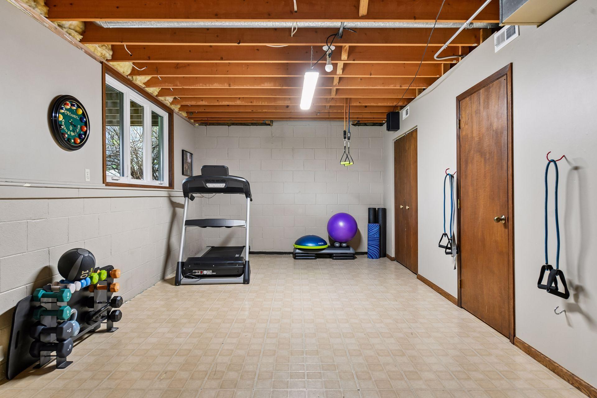 Unfinished space in the lower level is perfect for exercise area, game/pool table room or additional storage.