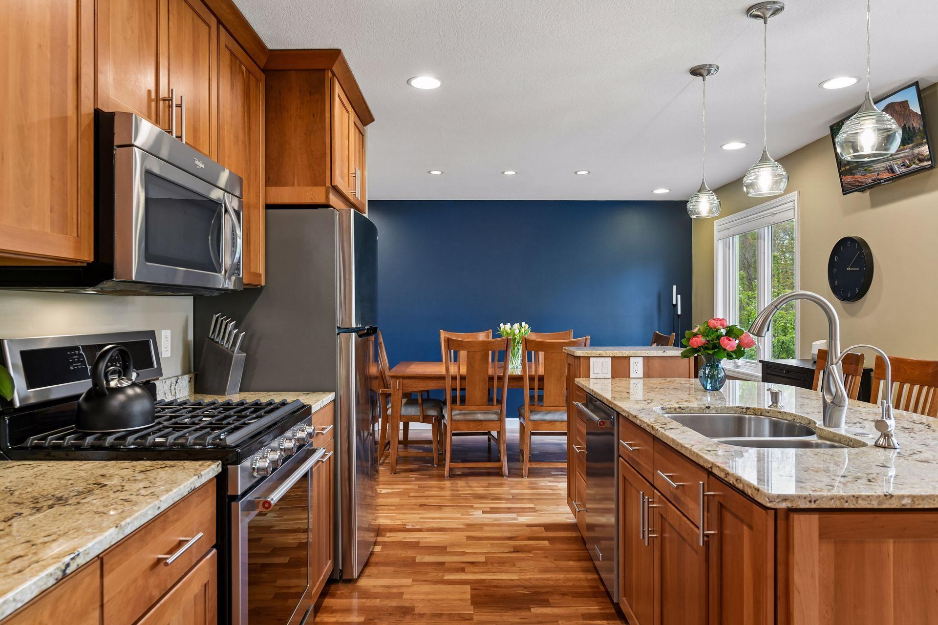 Seamless flow from kitchen to dining.