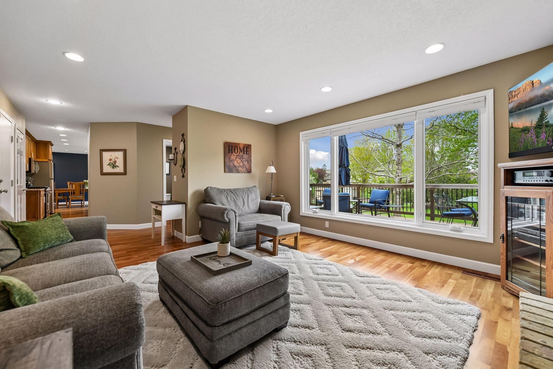 Wall of windows brightens the family room