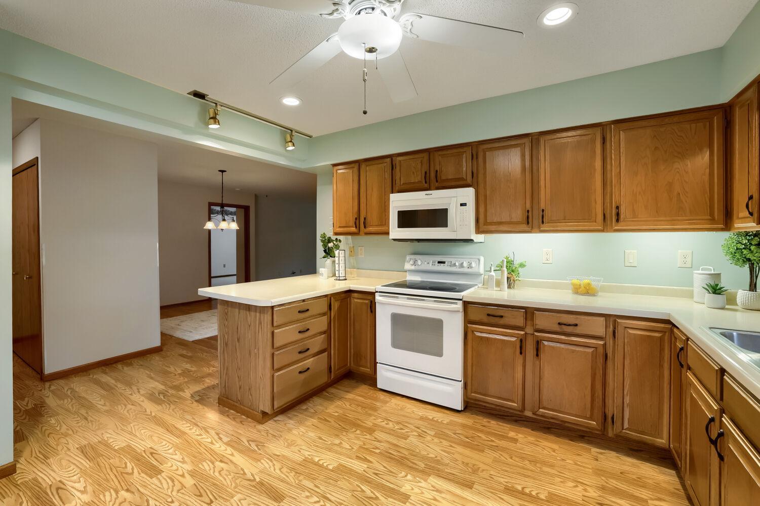 A snack counter and an area for a small table facing the window.
