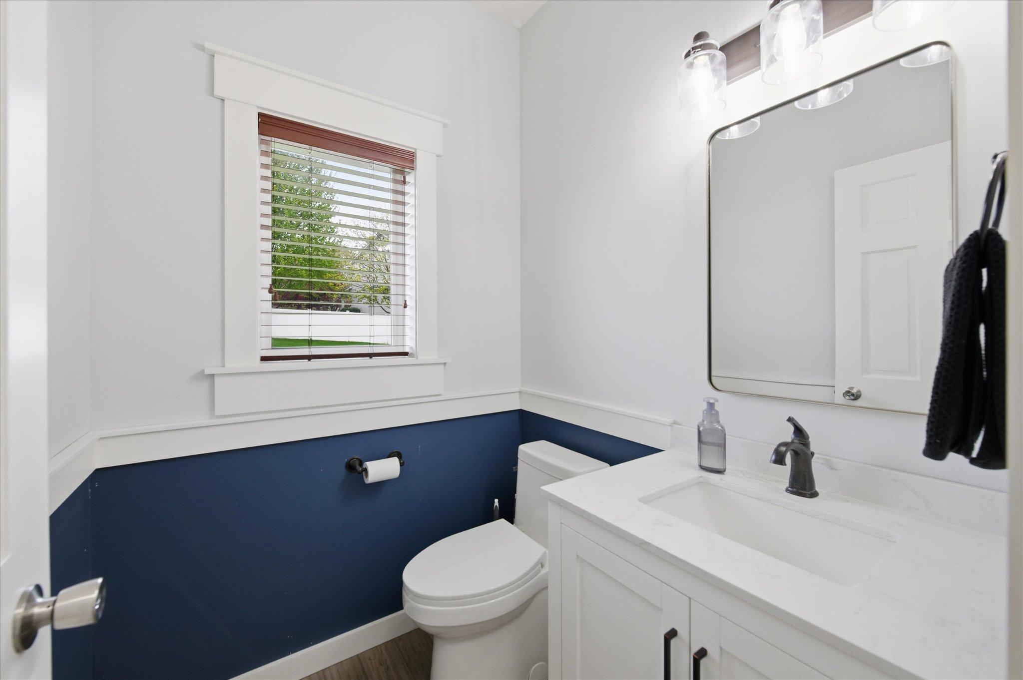 Powder room off the main floor laundry