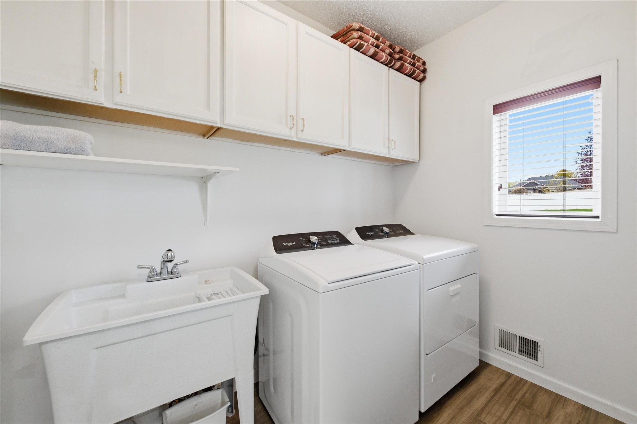 Laundry off the kitchen and back entry
