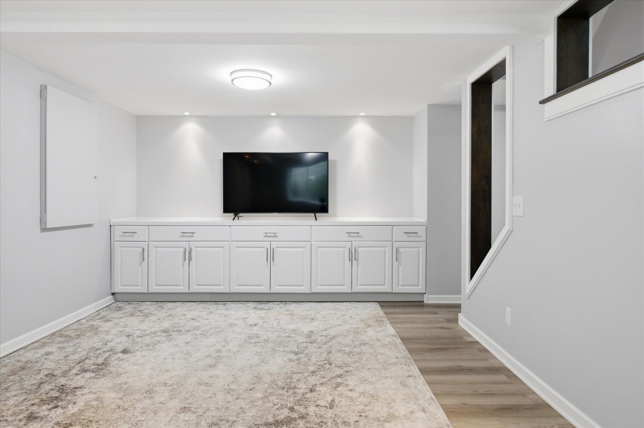 Built in cabinets in the lower level family room