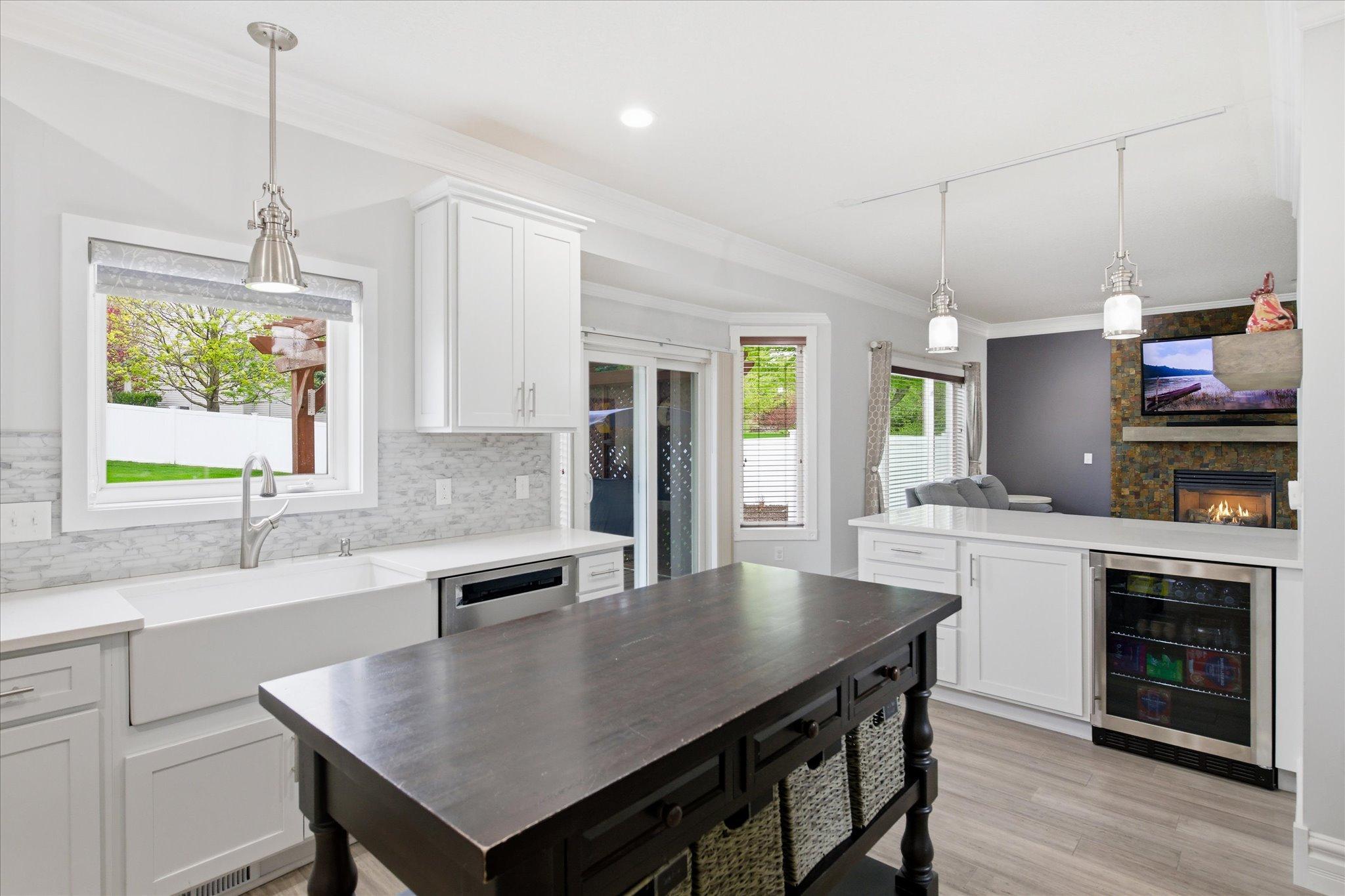 - Wine refrigerator and appliance lift cabinet