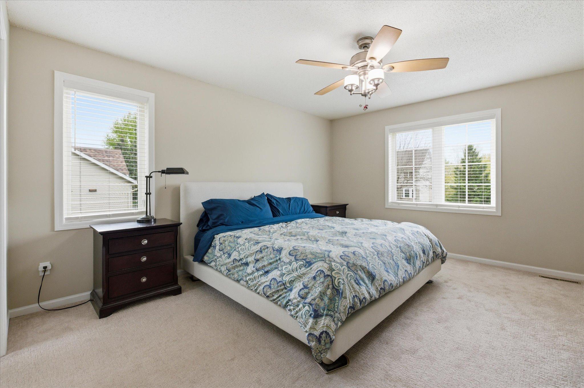 Private primary suite with walk-in closet