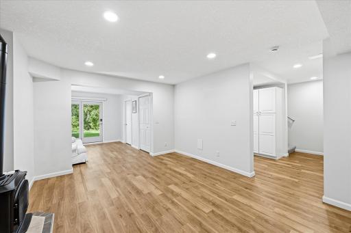 Lower level with walk-out to expansive backyard
