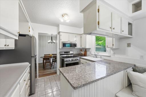 Open kitchen with lots of counter space and storage.