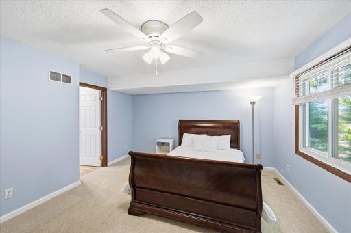 Primary bedroom with walk-in closet and walk through to main full bathroom