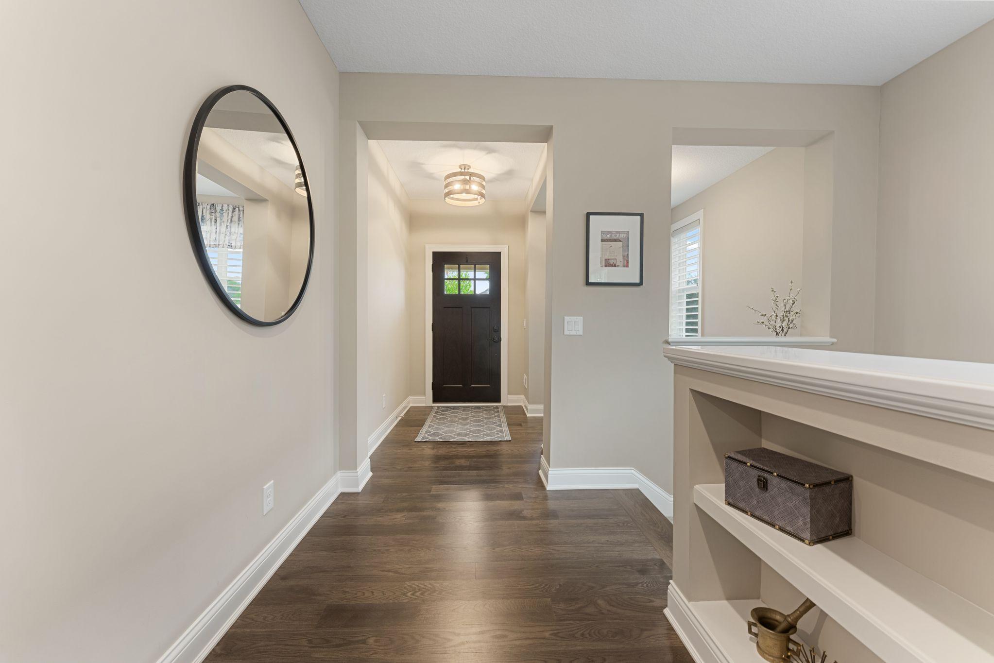 Right away, you'll be welcomed by an elevated style! Hardwood floors, white millwork -- built in shelves. Light pouring in from all angles - you will instantly feel at HOME!