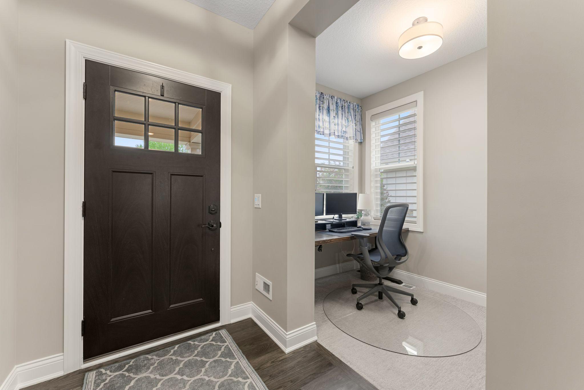 Don't miss a thing in your front office with light from the south and west. *Hunter Douglas Silhouette blinds remain with the home.