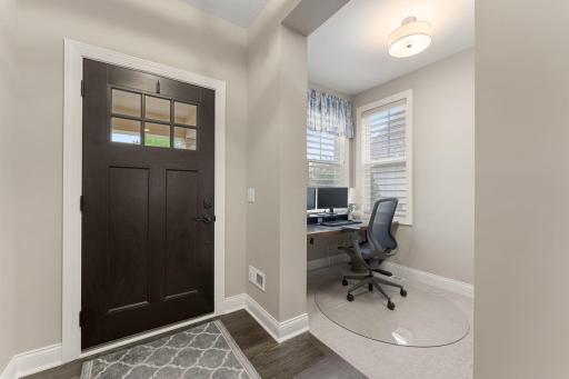 Don't miss a thing in your front office with light from the south and west. *Hunter Douglas Silhouette blinds remain with the home.