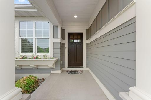 High-end finishes inside AND out! Hardi-board siding - Andersen Windows - wonderful floorplan and designs by award-winning Charles Cudd Builders.