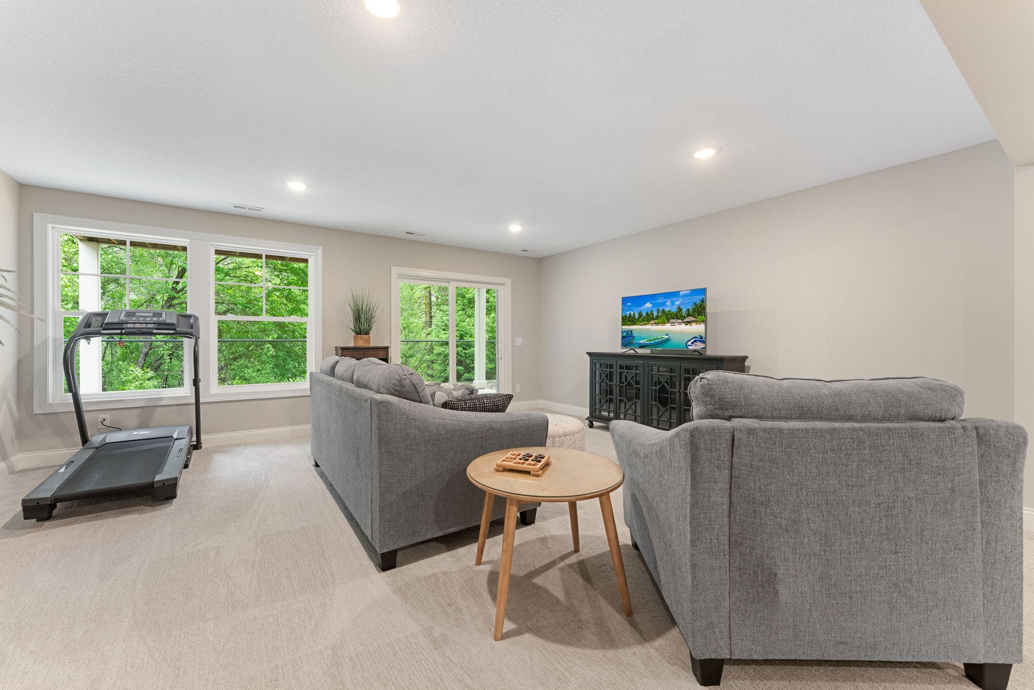The room is large enough for flexibility -- note there's space for exercise equipment OR you could have a place for games/toys!